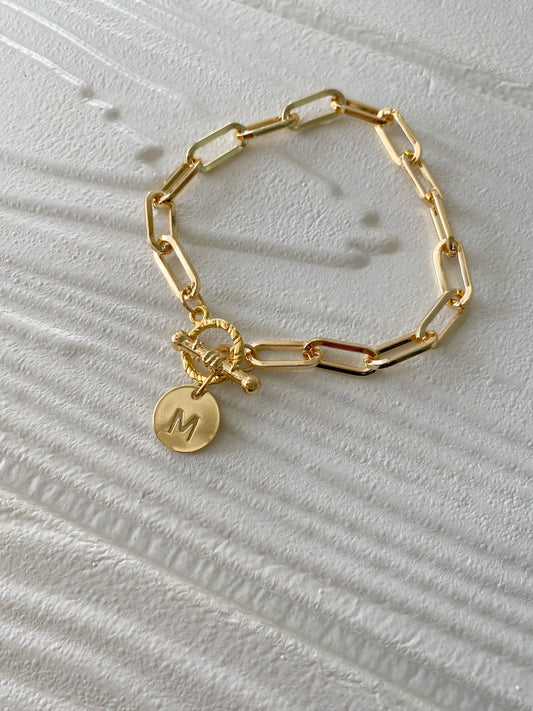 Pulsera broche T medalla